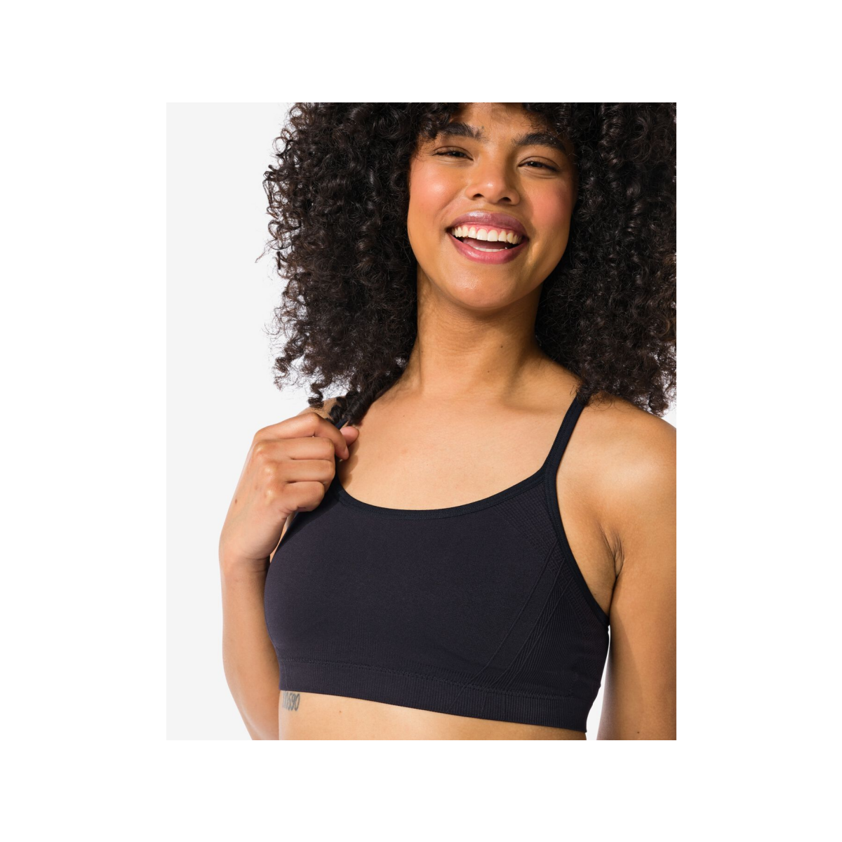 HEMA Sporttop light support zonder beugel naadloos zwart (zwart)